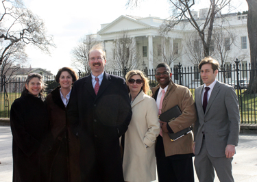 Dr. Leticia Flores, Prof. Patty Roberts, Dean Davison Douglas, Prof. Stacey-Rae Simcox, student Kevin Barrett, and John Paul Cimino visit the White House on behalf of veterans.