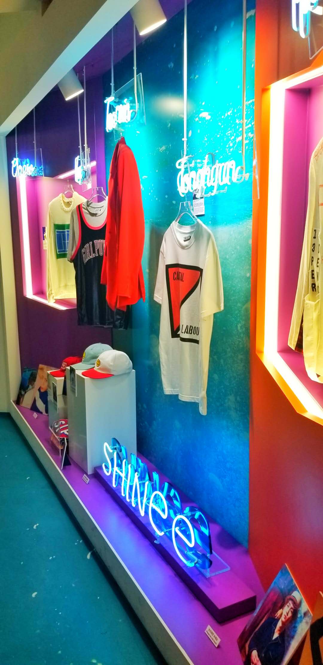 A display of SHINee's outfits in the Replay music video