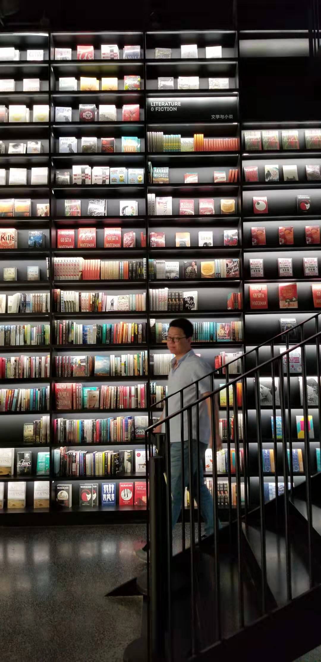A wall of books at Page One