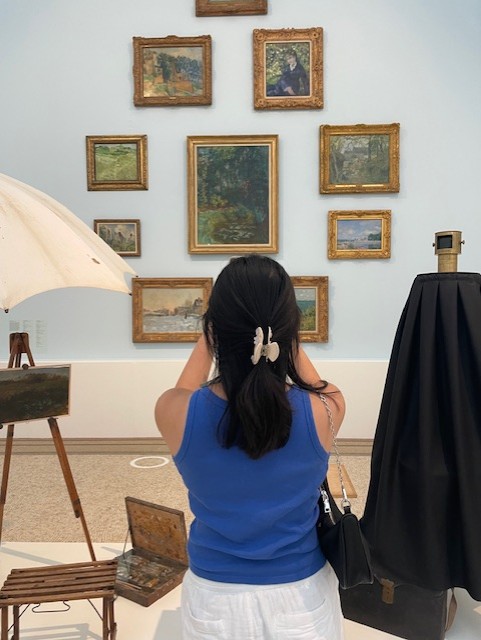 Olivia and the Impressionist Exhibit