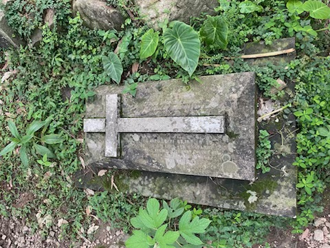 A grave in the church graveyard.