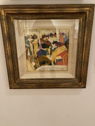 Painting of abstract colors and shapes vaguely depicting cafe scene