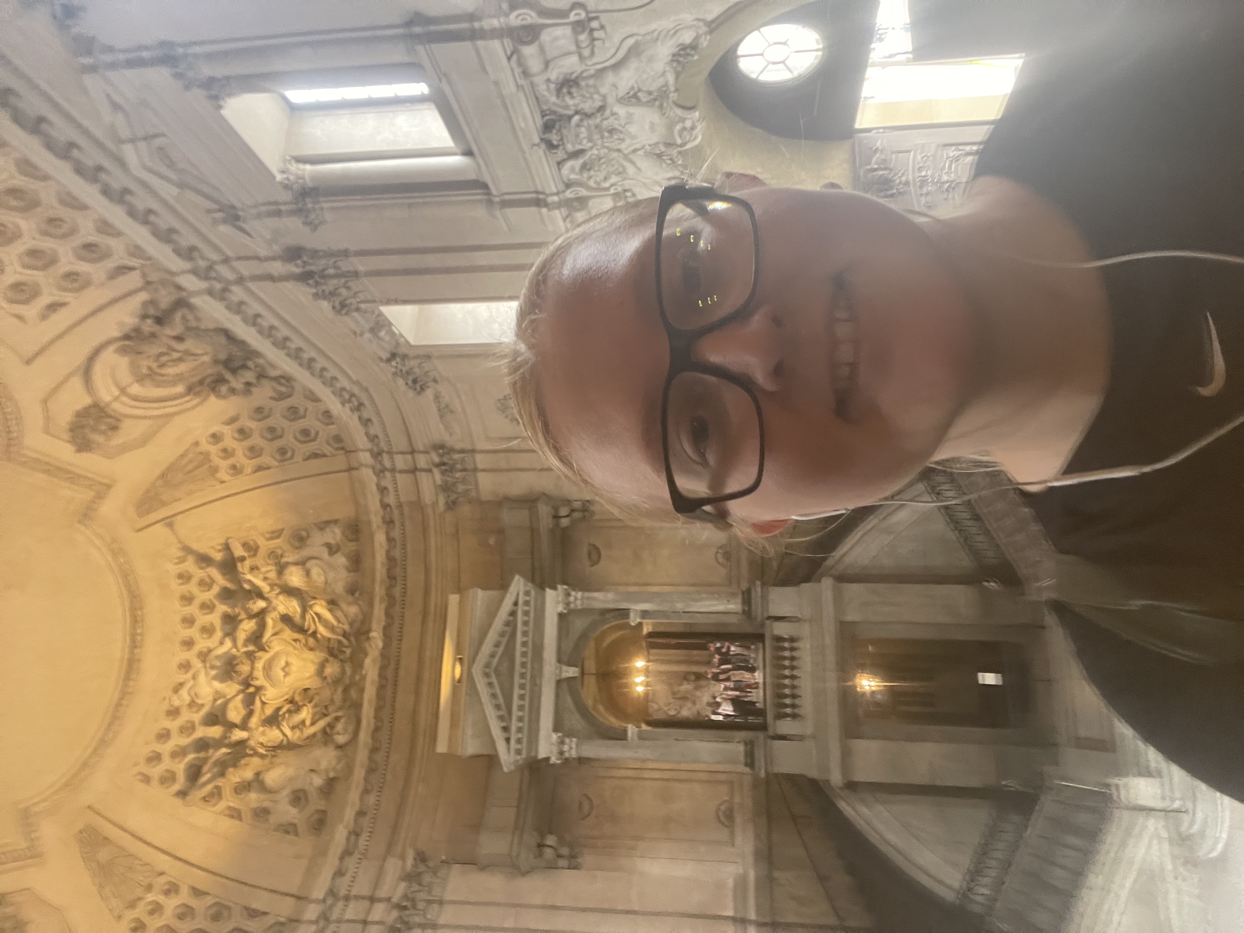 Cianna standing in front of the church that is located in the royal palace