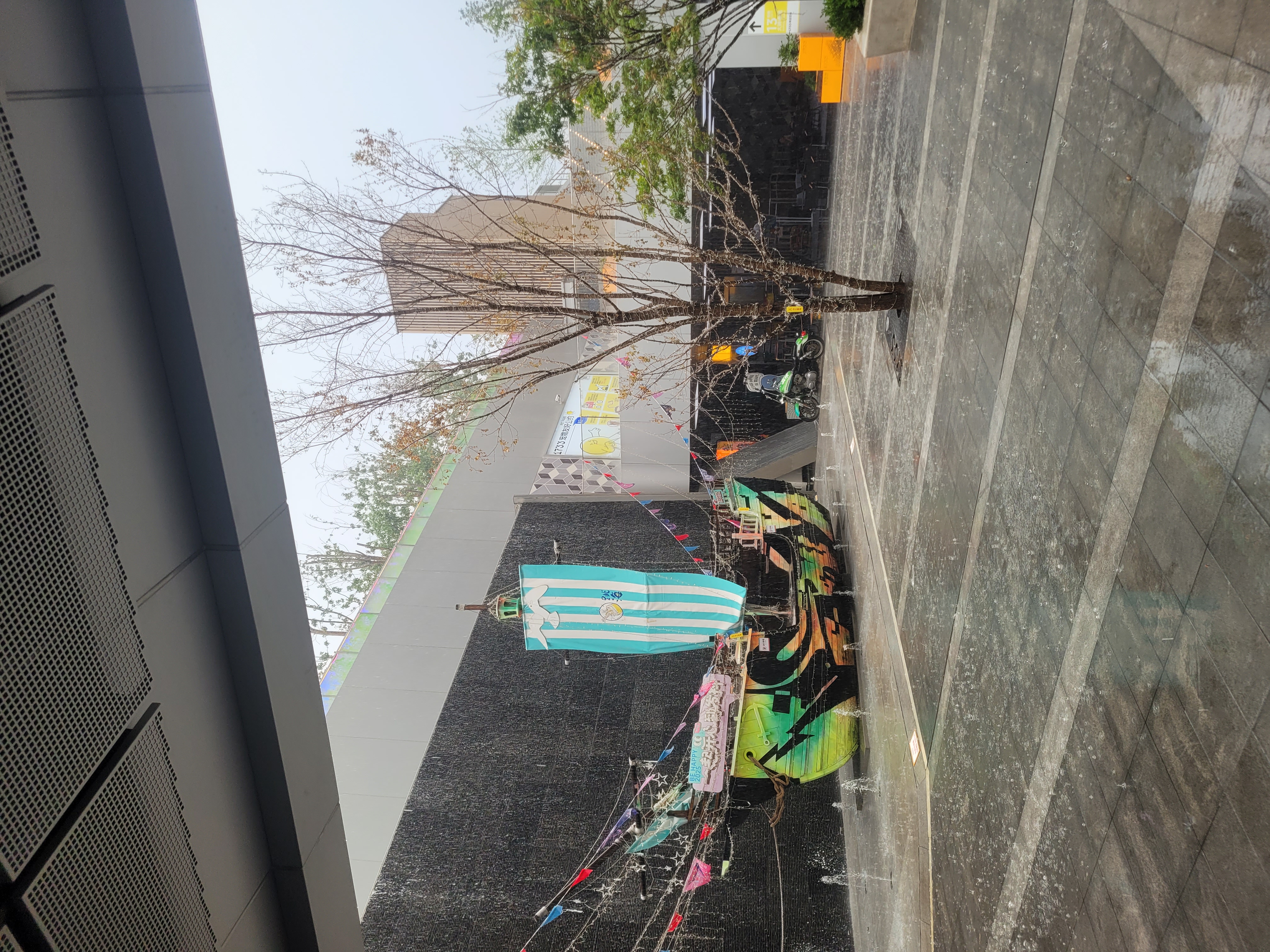 Kiddie Pirate Ship Next to the Dive Bar