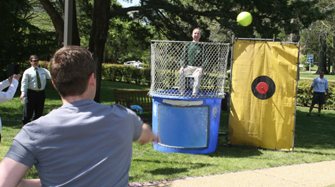 As promised, when the class made its goal Dean Douglas sat in the dunk tank on April 24 and risked getting soaked as students hurled softballs at the target.