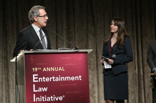 During a luncheon held in conjunction with the Grammys in February, entertainment attorney Ken Abdo recognizes Amerine as one of four finalists in a writing competition sponsored by the Grammy Foundation’s Entertainment Law Initiative.