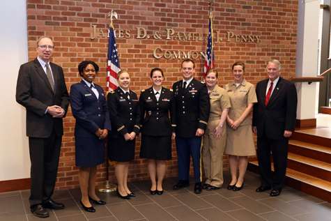 Dave Douglas met with student JAG officers and Adjunct Professor Paul Hutter during the annual law school celebration of Veterans Day on Nov. 12, 2018. The event offers a chance for reflection as well as an opportunity to acknowledge the service and sacrifice of the many active duty service members, veterans and their family members among faculty, staff, students and alumni. (Photo by David Morrill)