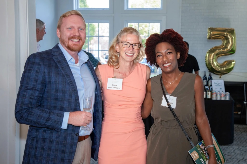 Professor Stacy Kern-Scheerer (center) with the Clinic’s first Spanish interpreter Michael B. Jordan, J.D. ’20, and Mechelle King, J.D. ’20, one of the first students enrolled in the Clinic.