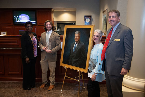 Alexis Swann, Regional President of TowneBank, Jack Rizzo'25, Betsy Calvo Anderson, and Mason School of Business Dean Todd Mooradian.