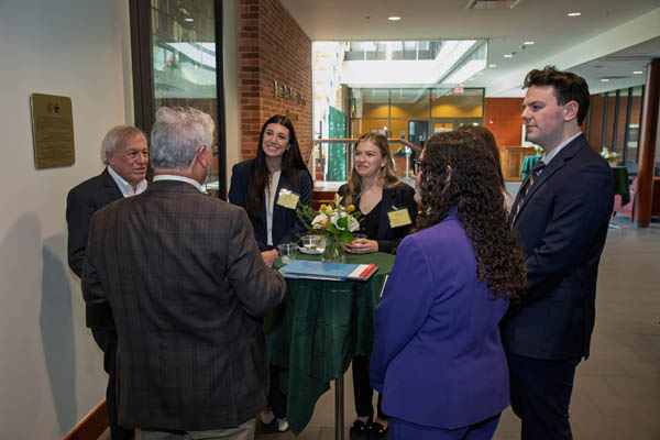 Students network with panelists