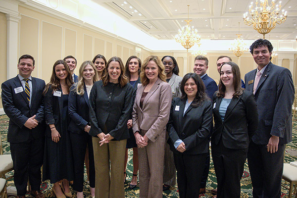 Justice Barrett with Professor Larsen and students. Photo: Elizabeth Blackney
