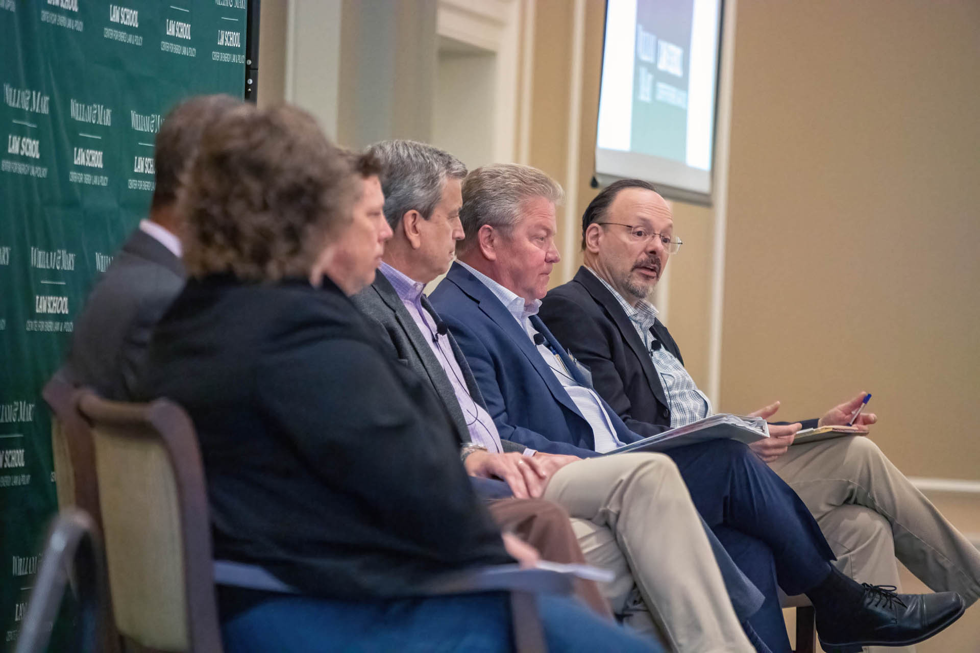 A panel moderated by Professor Jonathan Adler (right) of William & Mary Law School asked "What is the Future of Reliability and Affordability of Power in Virginia?"
