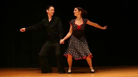 The winners:  Jonathan Stevens and Laura Heymann perform a swing dance during the Dancing with the William and Mary Stars competition. Photo by Stephen Salpukas.